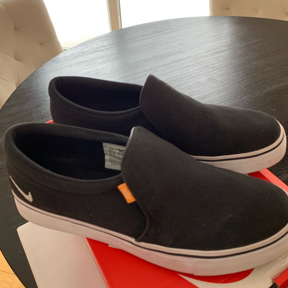 Womens Nike Court Royals black slip on sneaker